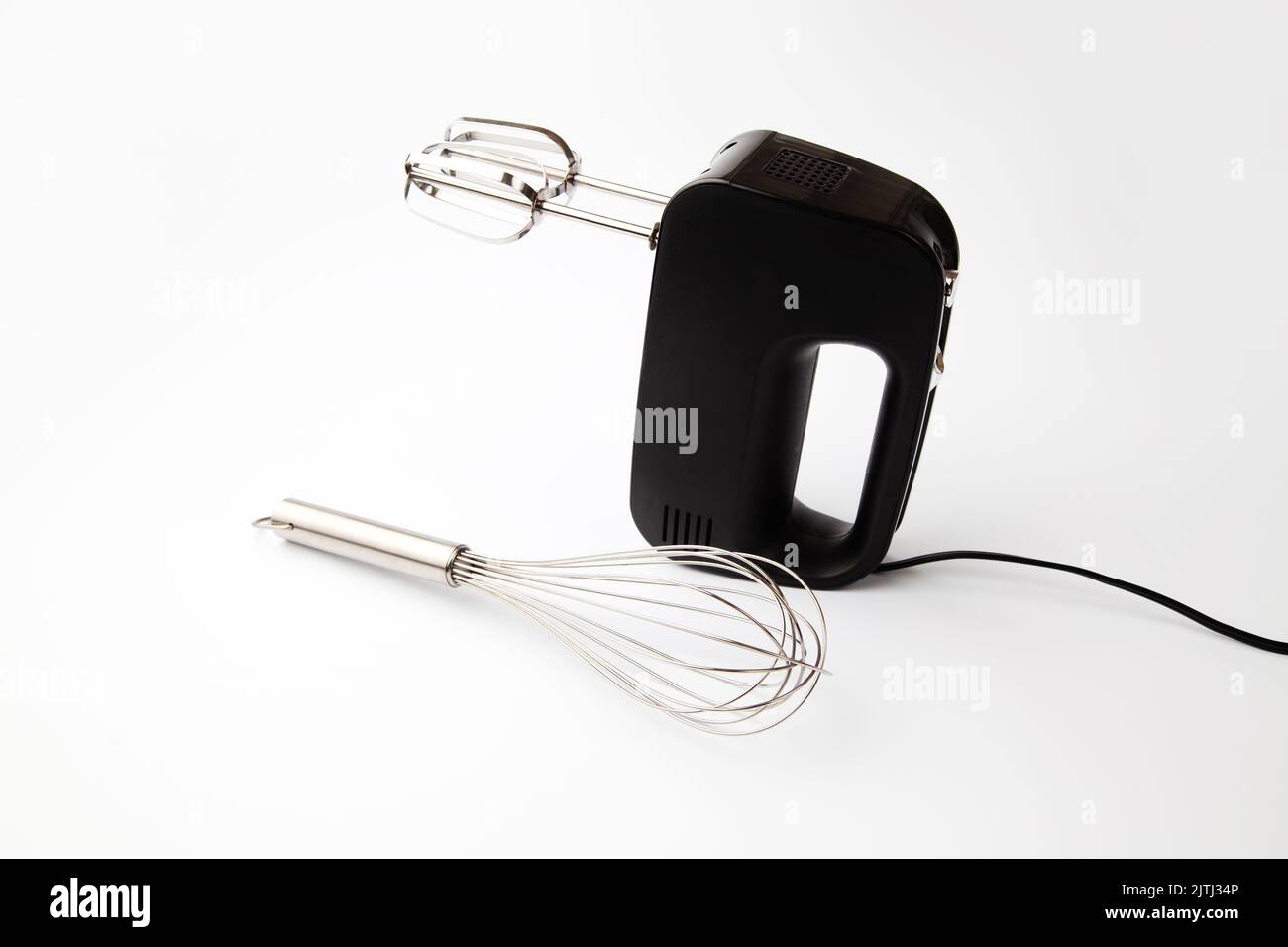whisk and electric hand mixer isolated on white background Stock Photo