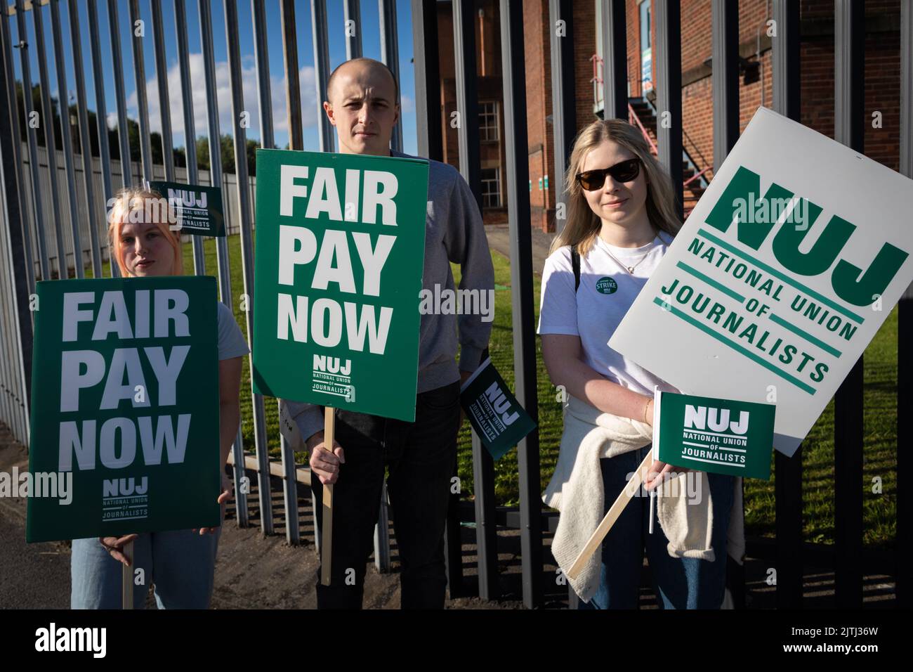 Manchester, UK. 31st Aug, 2022. Three journalists stand at the picket line for the first day of strike action. Reach which publishes several newspapers failed to negotiate a deal away from the proposed 3% offered which is below inflation and during a Cost Of Living Crisis. Credit: Andy Barton/Alamy Live News Stock Photo