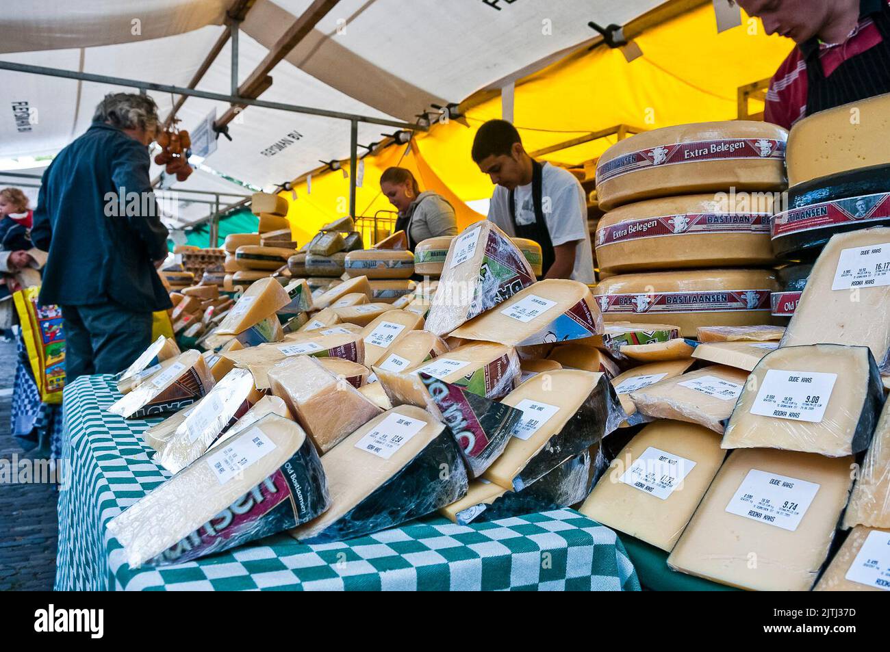 Cheese on sale at a Dutch outdoor market in Amsterdam. Stock Photo