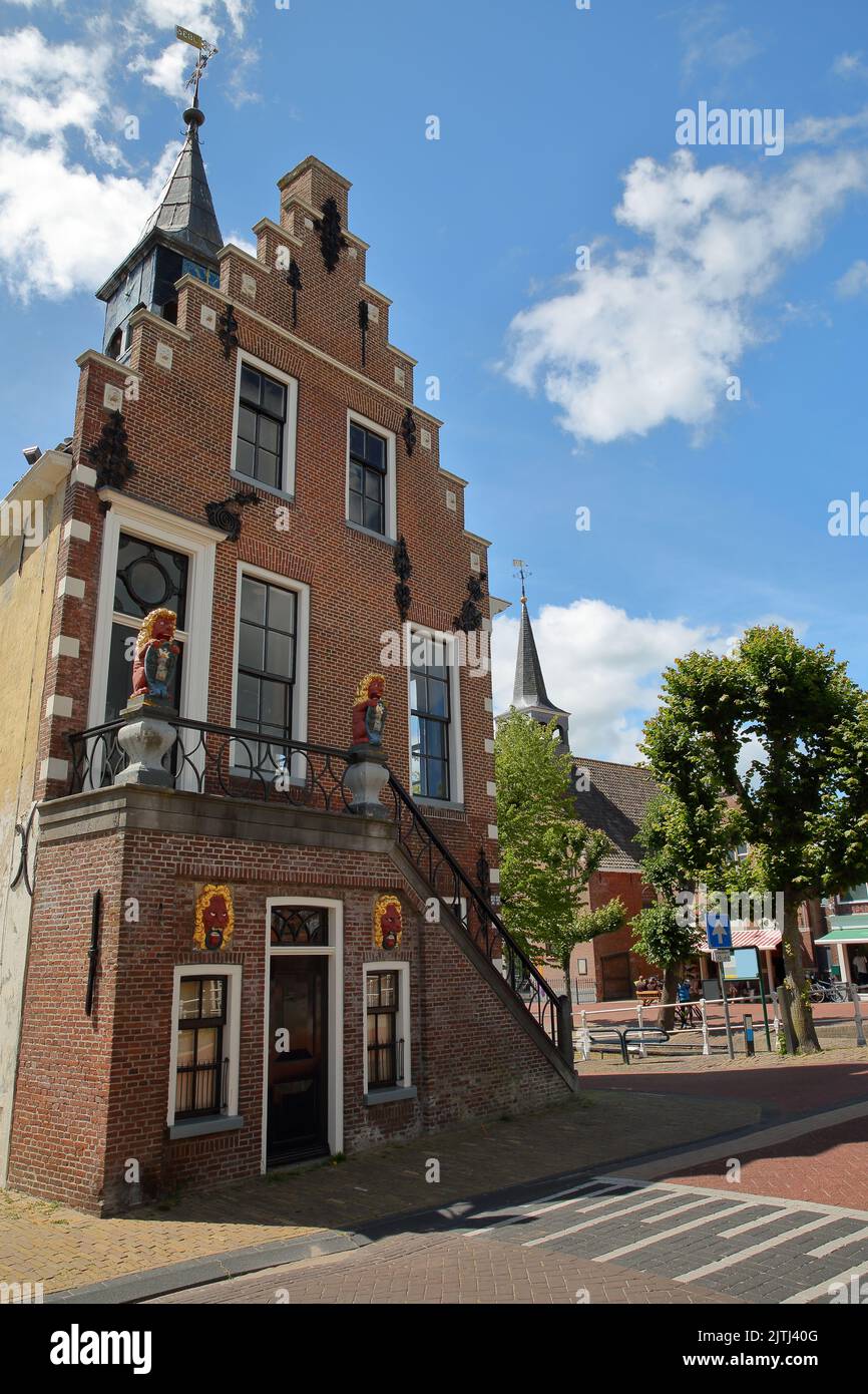 The external facade of the Raadhuis (former town hall built in 1615) in Balk, Friesland, Netherlands, located in the historic center of Balk Stock Photo
