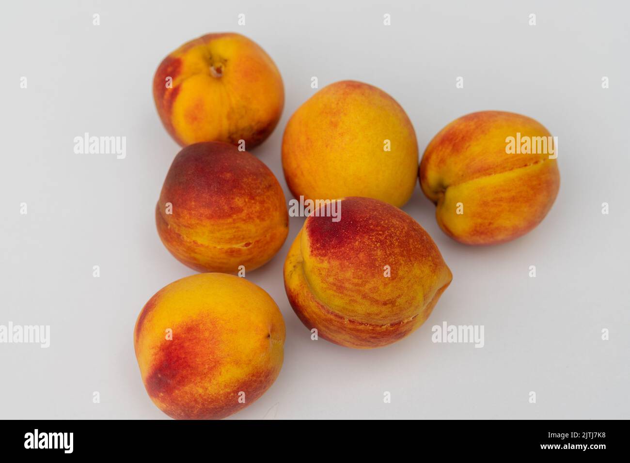 Fresh organic peach fruit isolated on white background Stock Photo