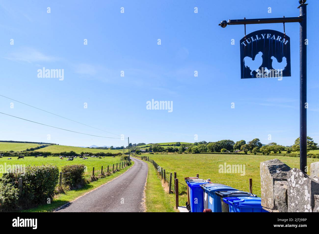Sign for "Tully Farm" at the end of a long lane Stock Photo Alamy