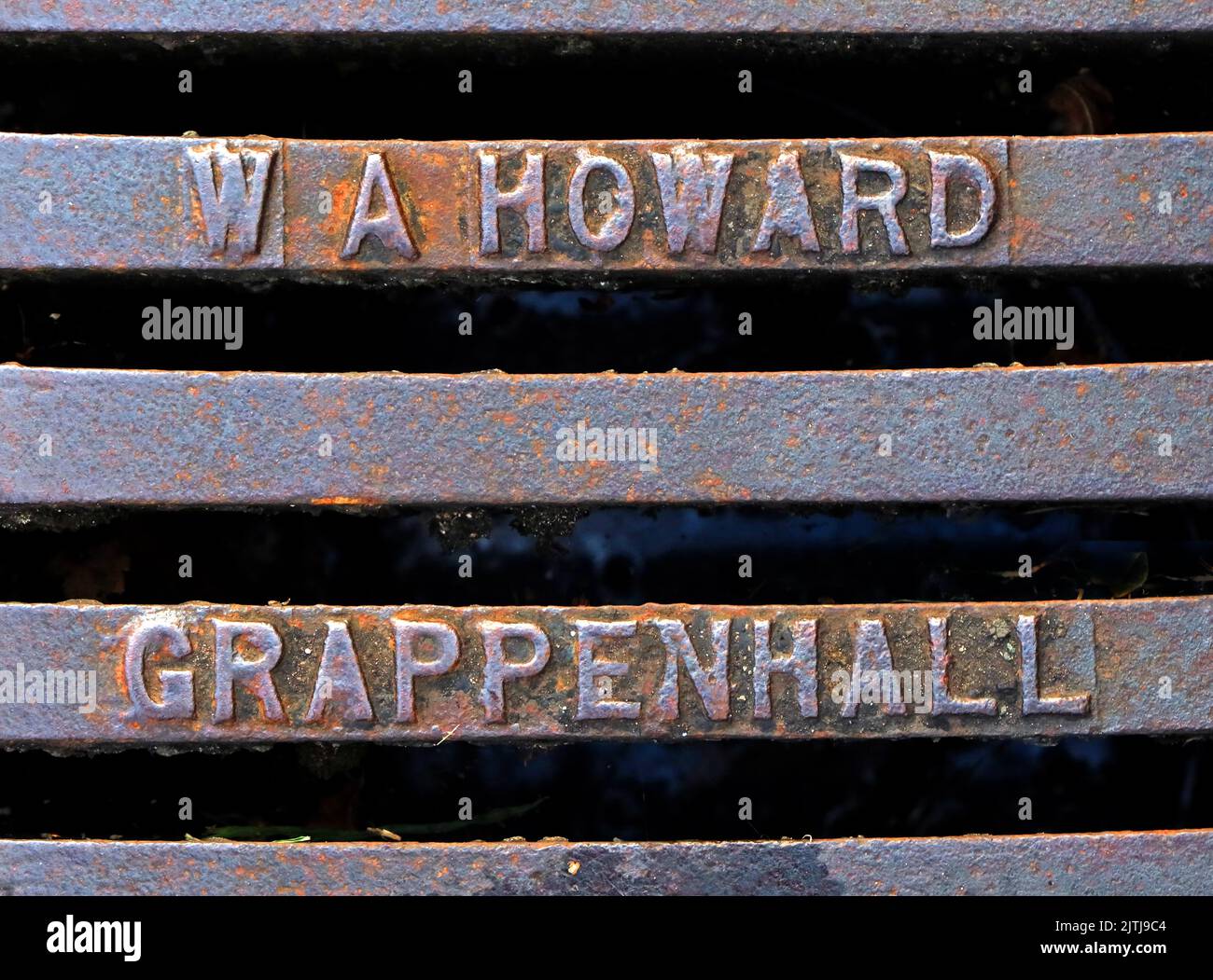 WA Howard,Grappenhall embossed cast iron grid, Warrington, Cheshire, England, UK, WA4 2SJ Stock Photo