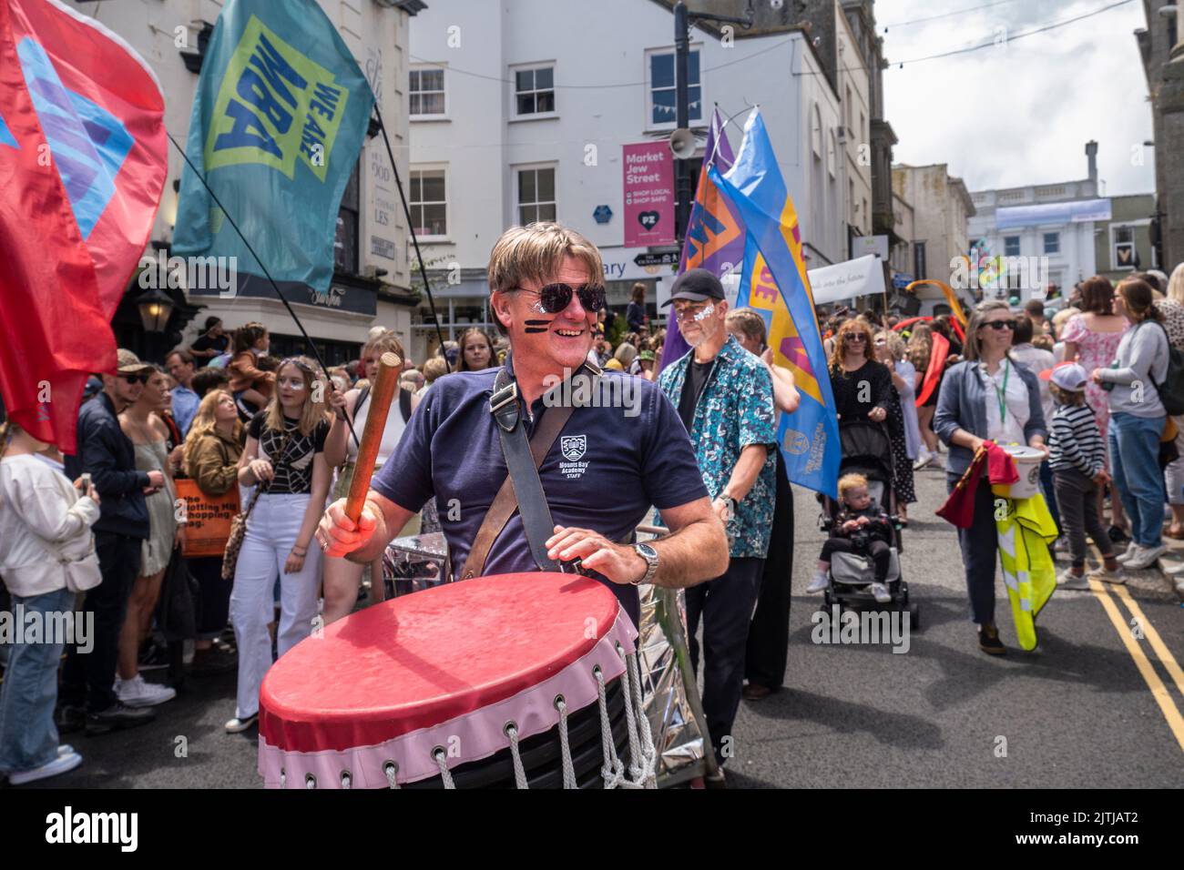 Mounts Bay Academy participating in the Mazey Day parade celebrations as part of the Golowan Festival in Penzance in Cornwall in the UK. Stock Photo