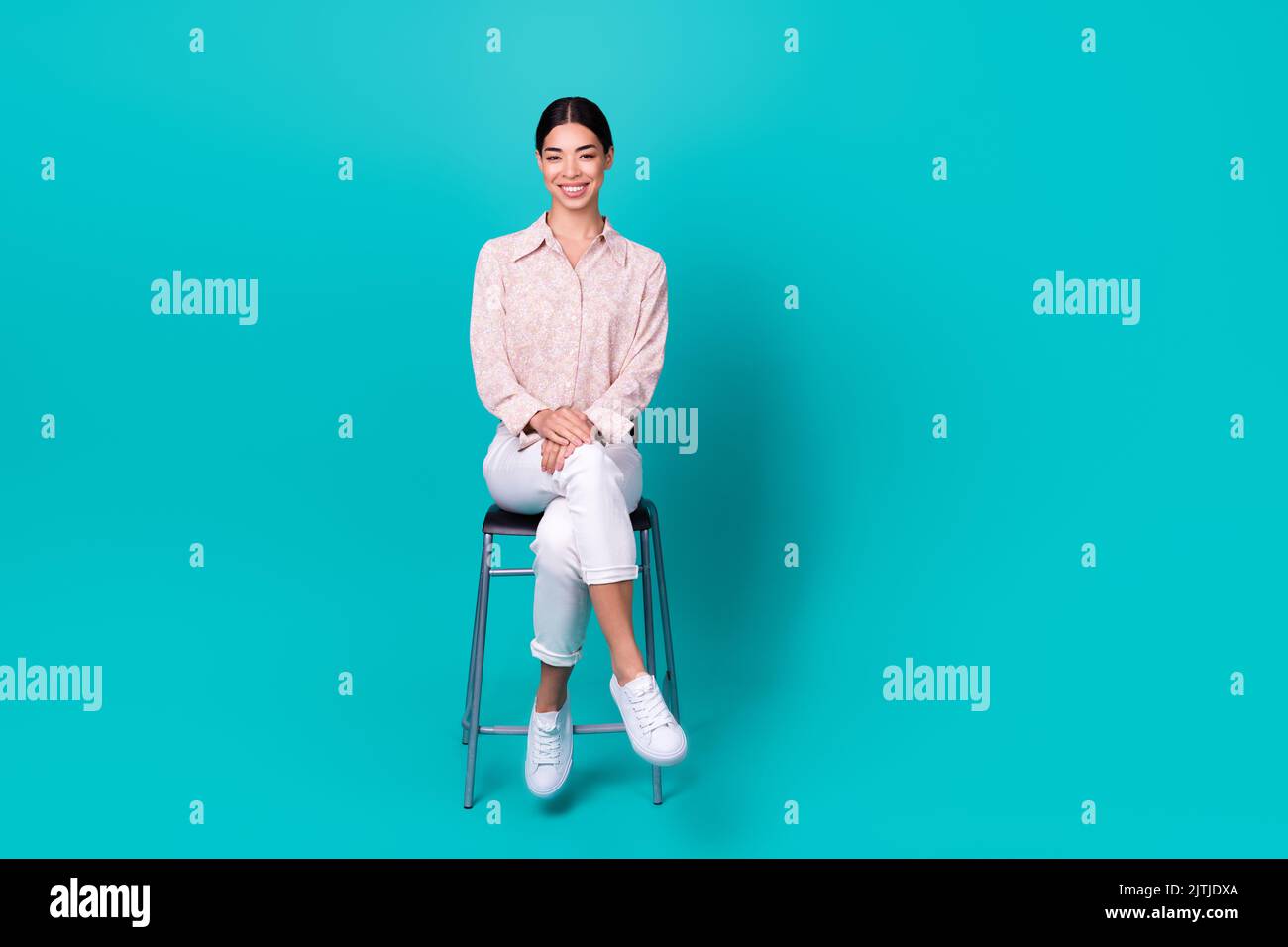 Full size photo of young korean woman sitting chair beaming smile wear
