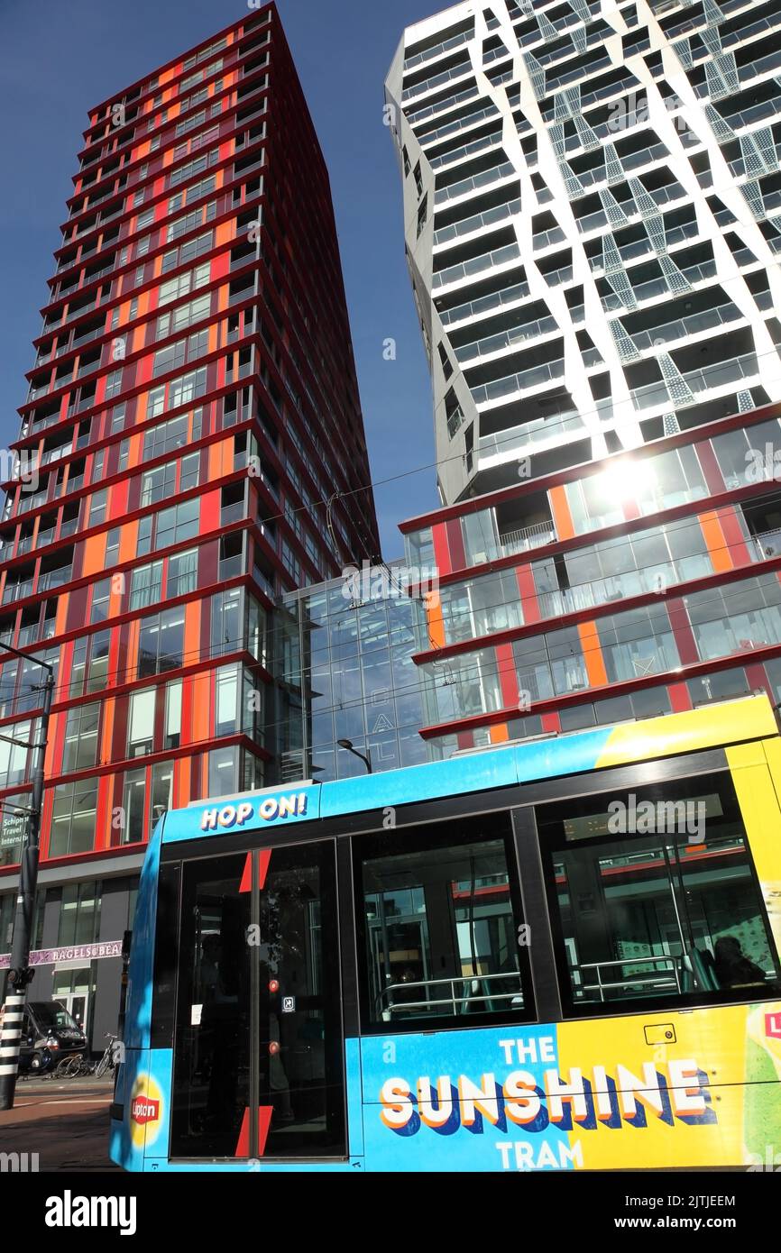 Tram passing the Calypso apartment building designed by Will Alsop, Rotterdam, Netherlands. Stock Photo