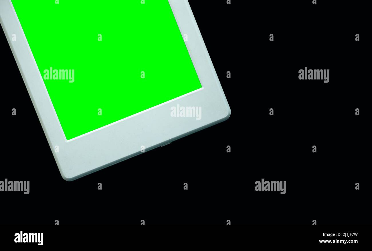 An eReader on its own, on black, in portrait orientation. It has a