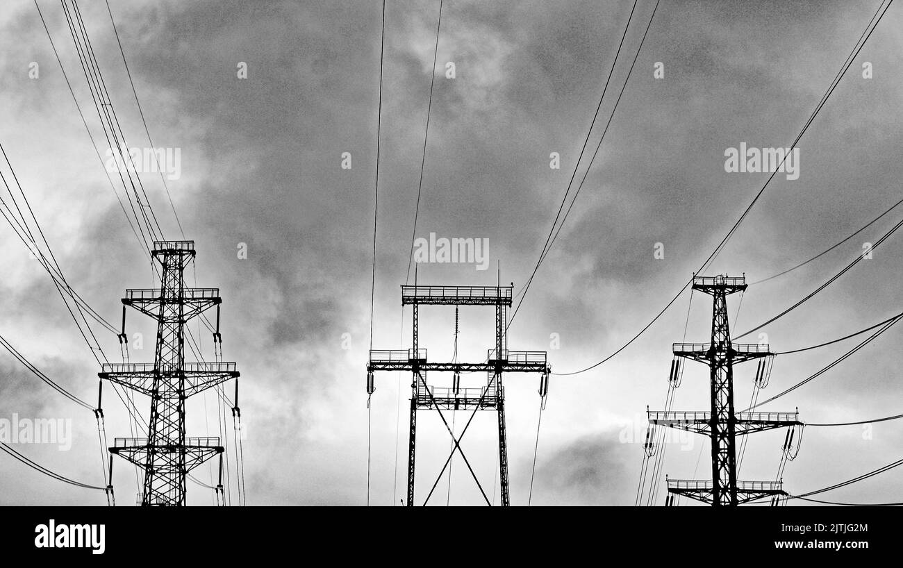 High-voltage towers on the banks of the Neva River in St. Petersburg on ...