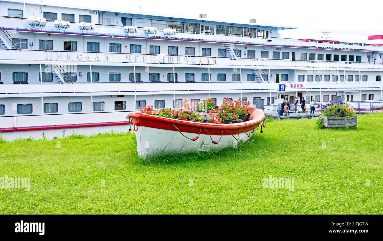 Ornamental boat with flowers in the cruise port of Saint Petersburg in the Russian Federation, Russia Stock Photo