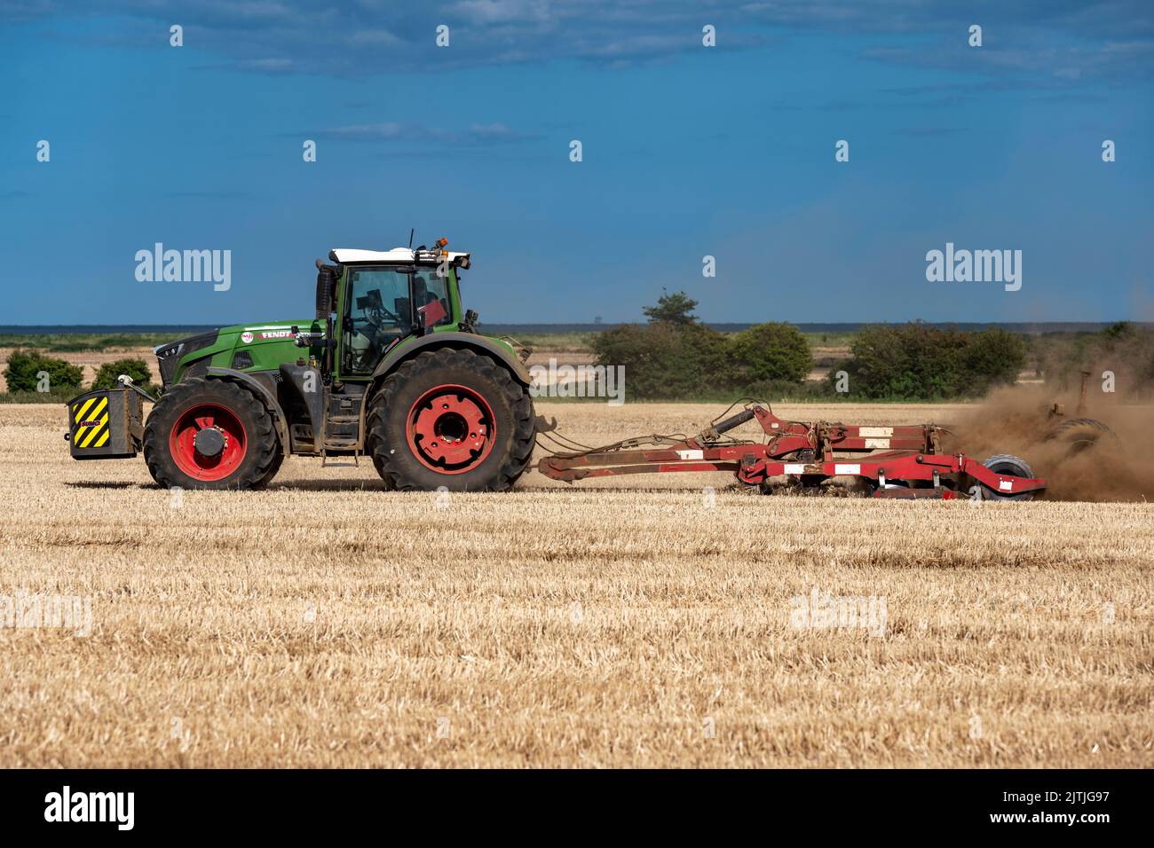 Stubble field being cultivated Bawdsey Suffolk UK Stock Photo