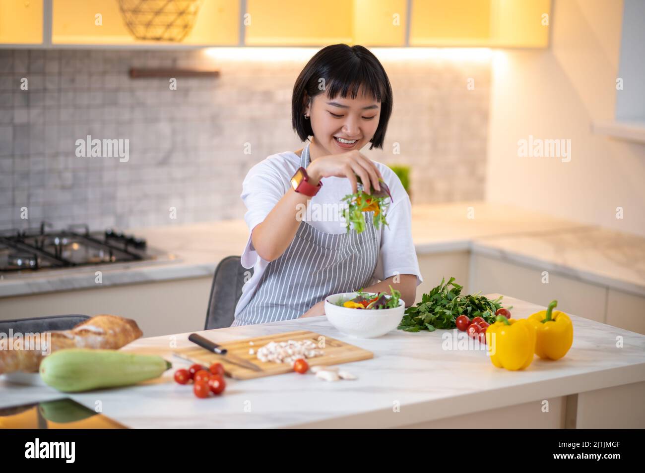 Contented asian adult woman hi-res stock photography and images - Alamy