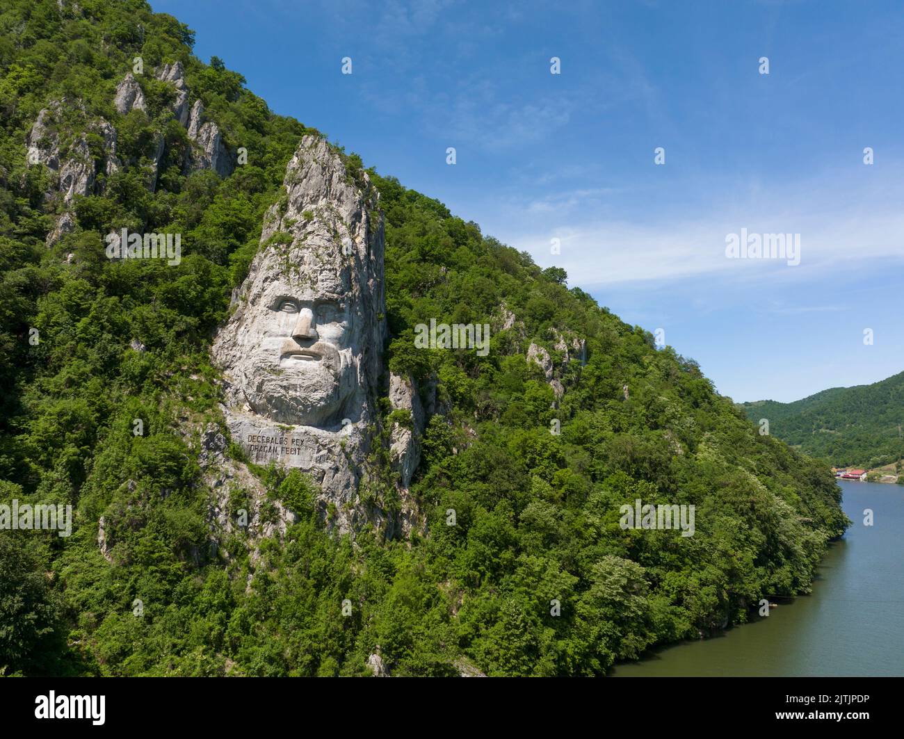 Sculpted Head of Decebal Dacian King, placed on the course of Danube River Stock Photo