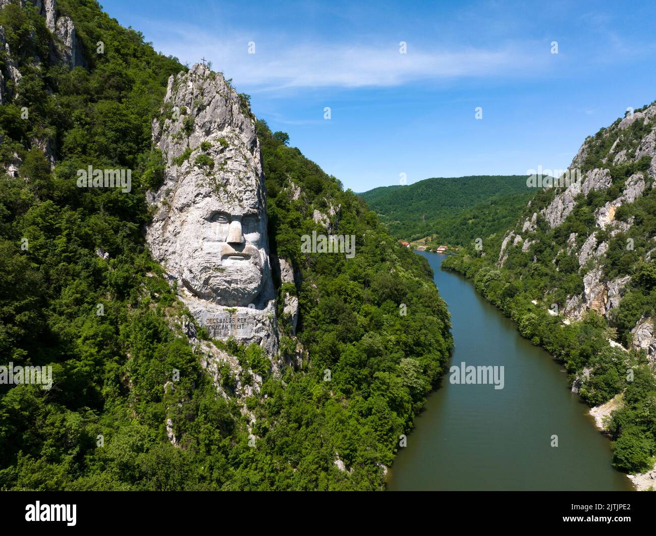Sculpted Head of Decebal Dacian King, placed on the course of Danube River Stock Photo