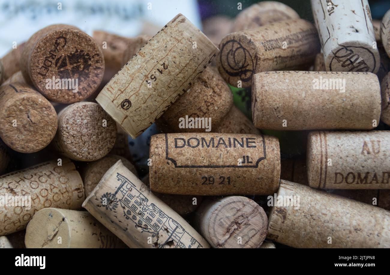 Closeup of corks in the window of El Vinos wine shop and bar as