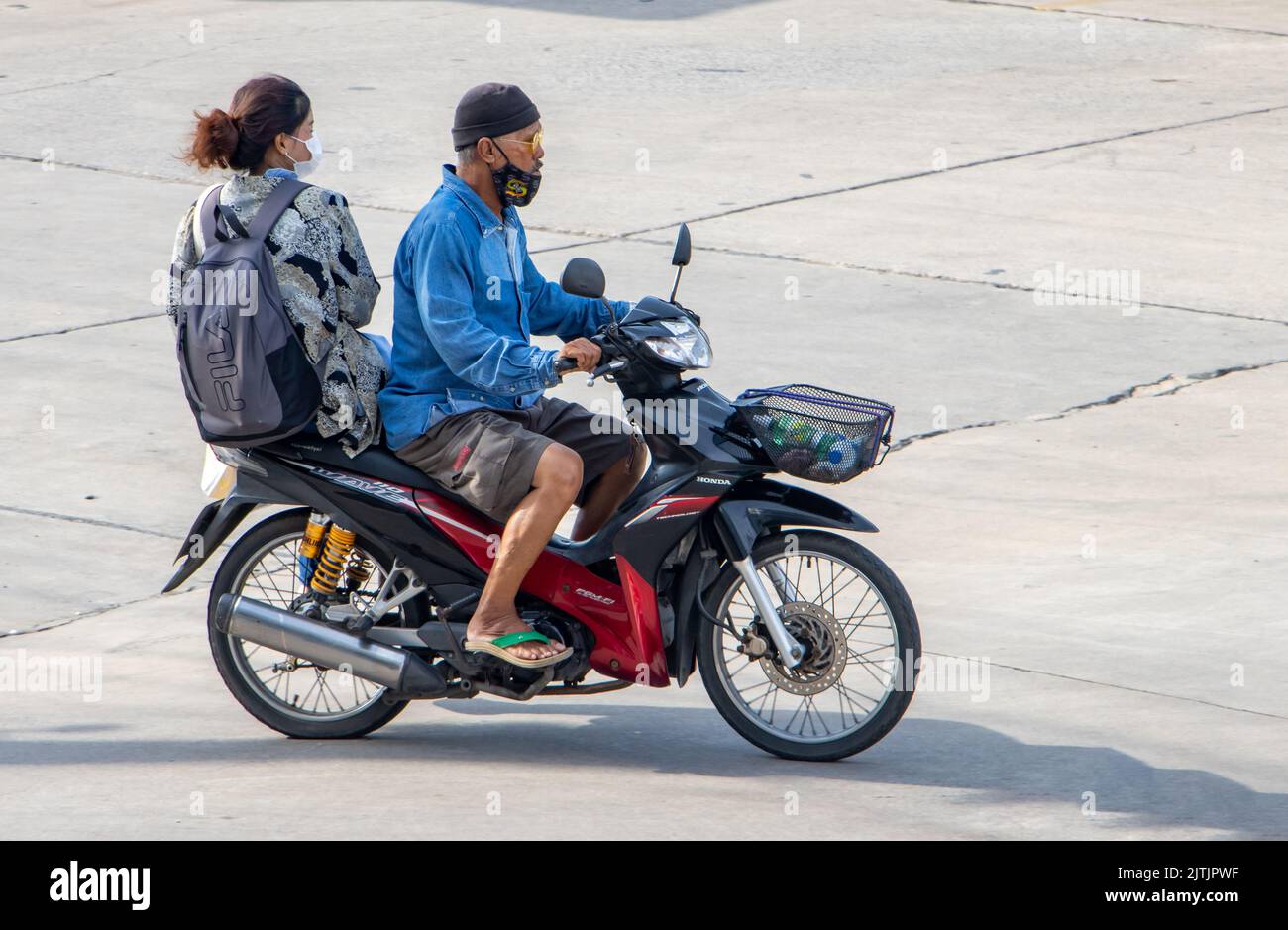 SAMUT PRAKAN, THAILAND, MAY 29 2022, The pair rides on motorcycle at ...