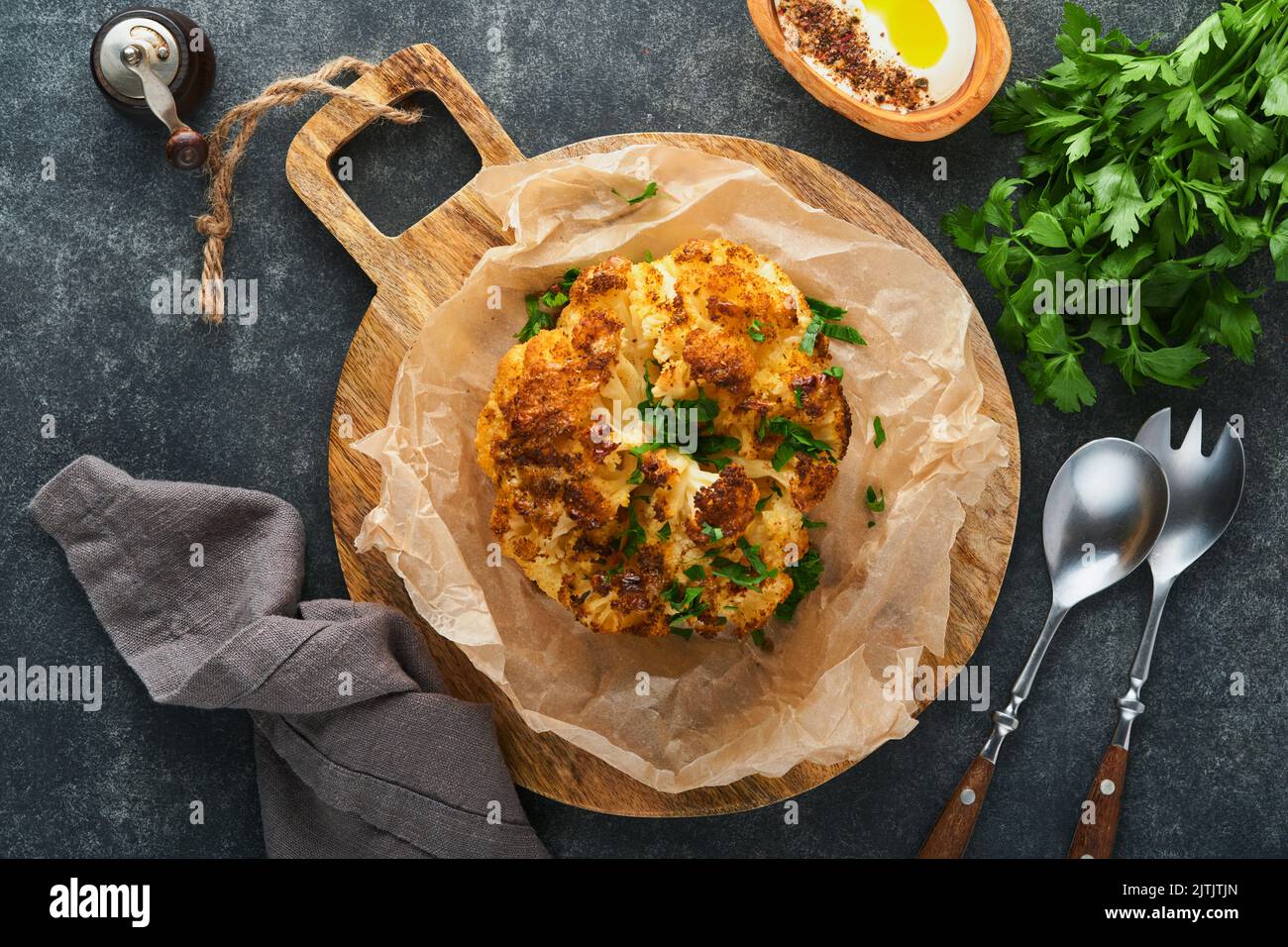 Baked cauliflower. Oven or whole baked cauliflower spices and herbs