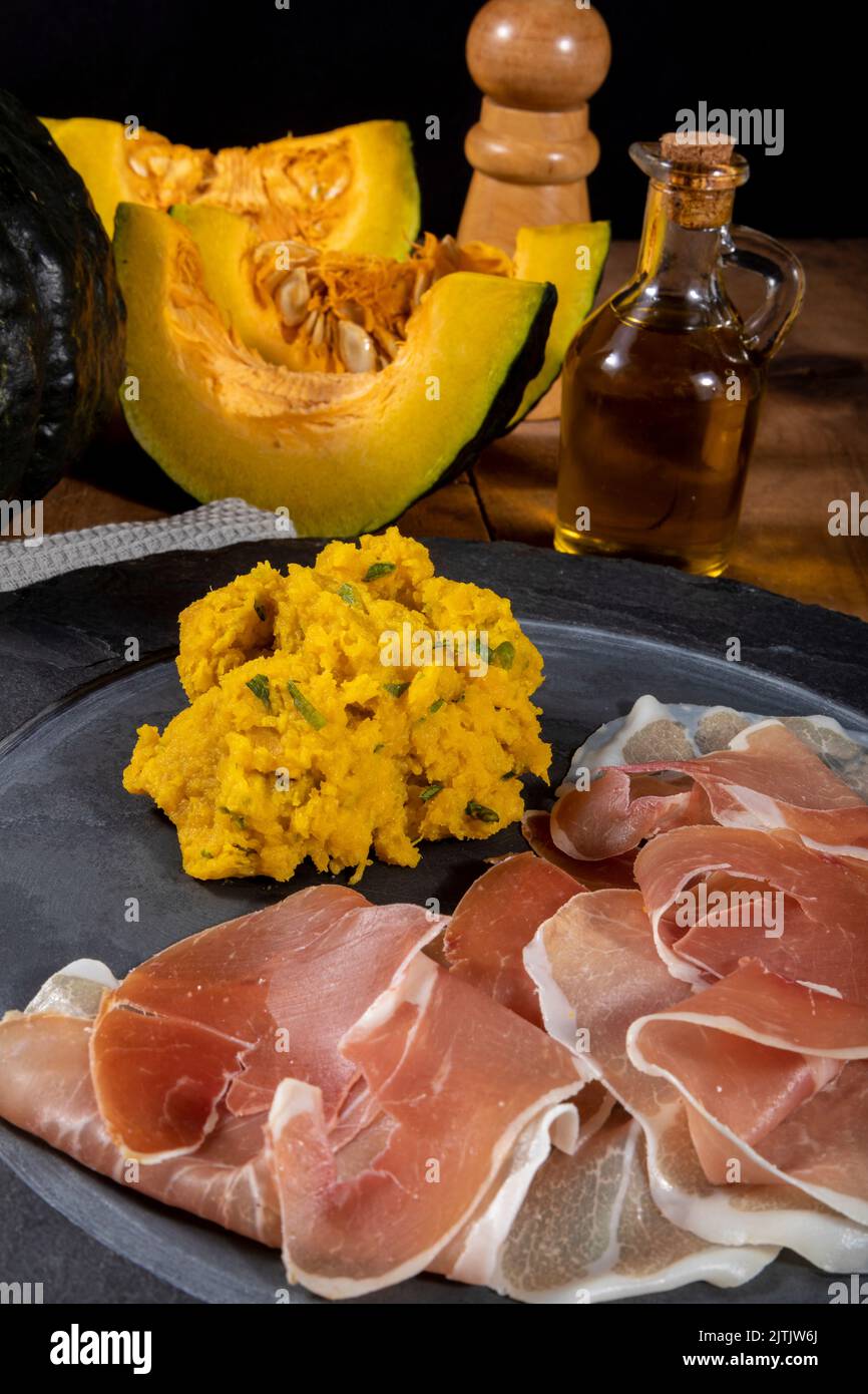 Parma ham (jamon) traditional Italian meat specialties. Stock Photo