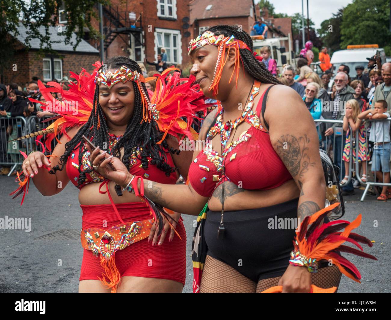 2022 August 29 - UK - Yorkshire - Leeds West Indian Carnival - Colourful dancers in the parade on Harehills Lane Stock Photo
