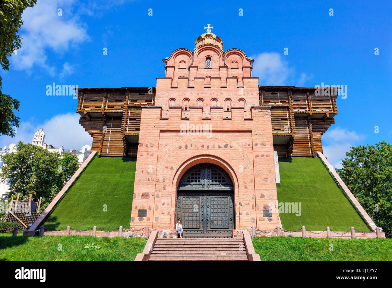 The reconstructed building of the ancient Golden Gate in the center of Kyiv against the blue sky on a summer day. August 21, 2022 Kyiv, Ukraine. Stock Photo