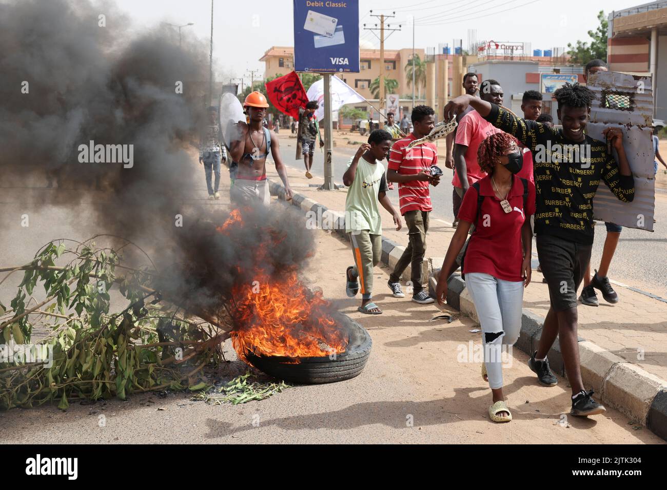 Protesters march during a rally against military rule following the last coup, in Khartoum, Sudan August 31, 2022. REUTERS/Mohamed Nureldin Abdallah Stock Photo