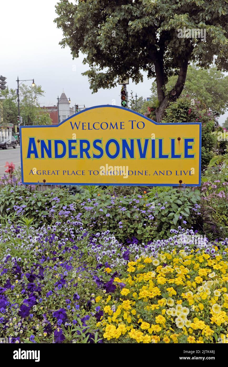 Welcome to Andersonville sign with its slogan 'A Great Place to Shop, Dine, and Live' located at Clark Street and Ashland Avenue in Chicago. Stock Photo