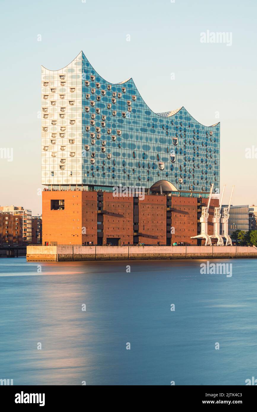 The Elbe Philharmonic Hall and Hafencity in Hamburg harbour in the evening sun, Germany Stock Photo