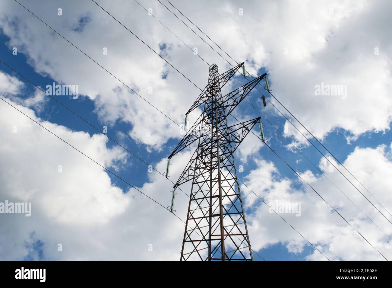 Transmission tower of high voltage overhead power lines, symbol of