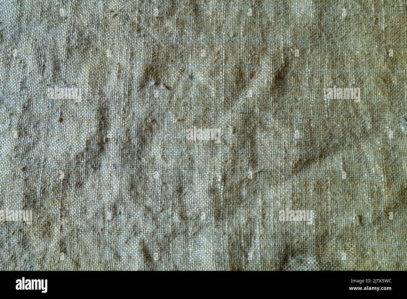 Natural background made of coarse threads. Old bag close-up. Stock Photo