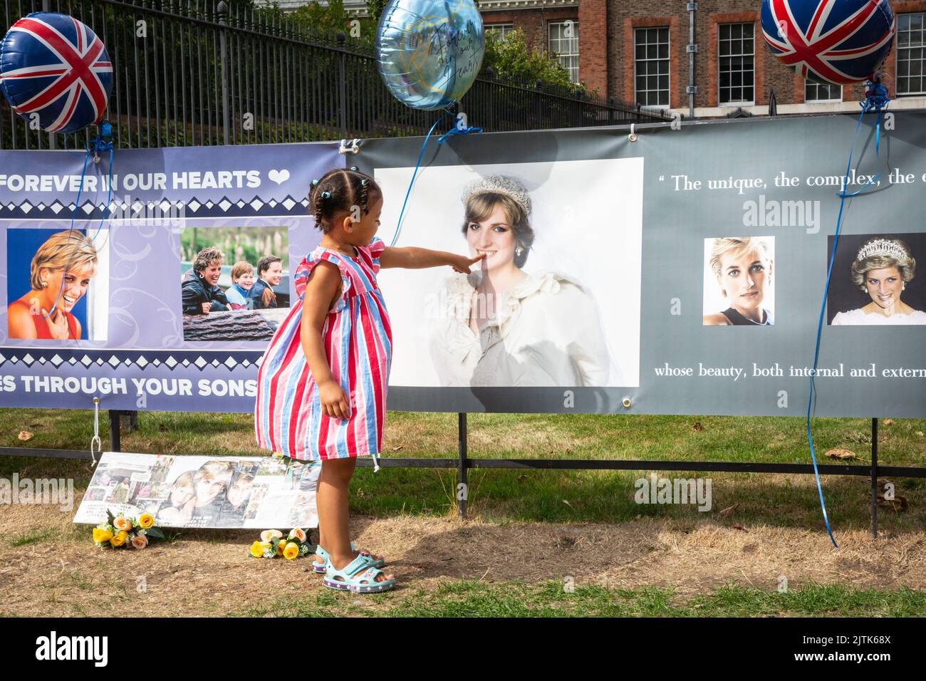 London, UK. 31st Aug, 2022. Amira, 3yrs old, is here with her family to remember Diana. Royal fans and visitors gather at the gates to Kensington Palace to commemorate the 25th anniversary of th tragic death of Diana Princess of Wales. Credit: Imageplotter/Alamy Live News Stock Photo