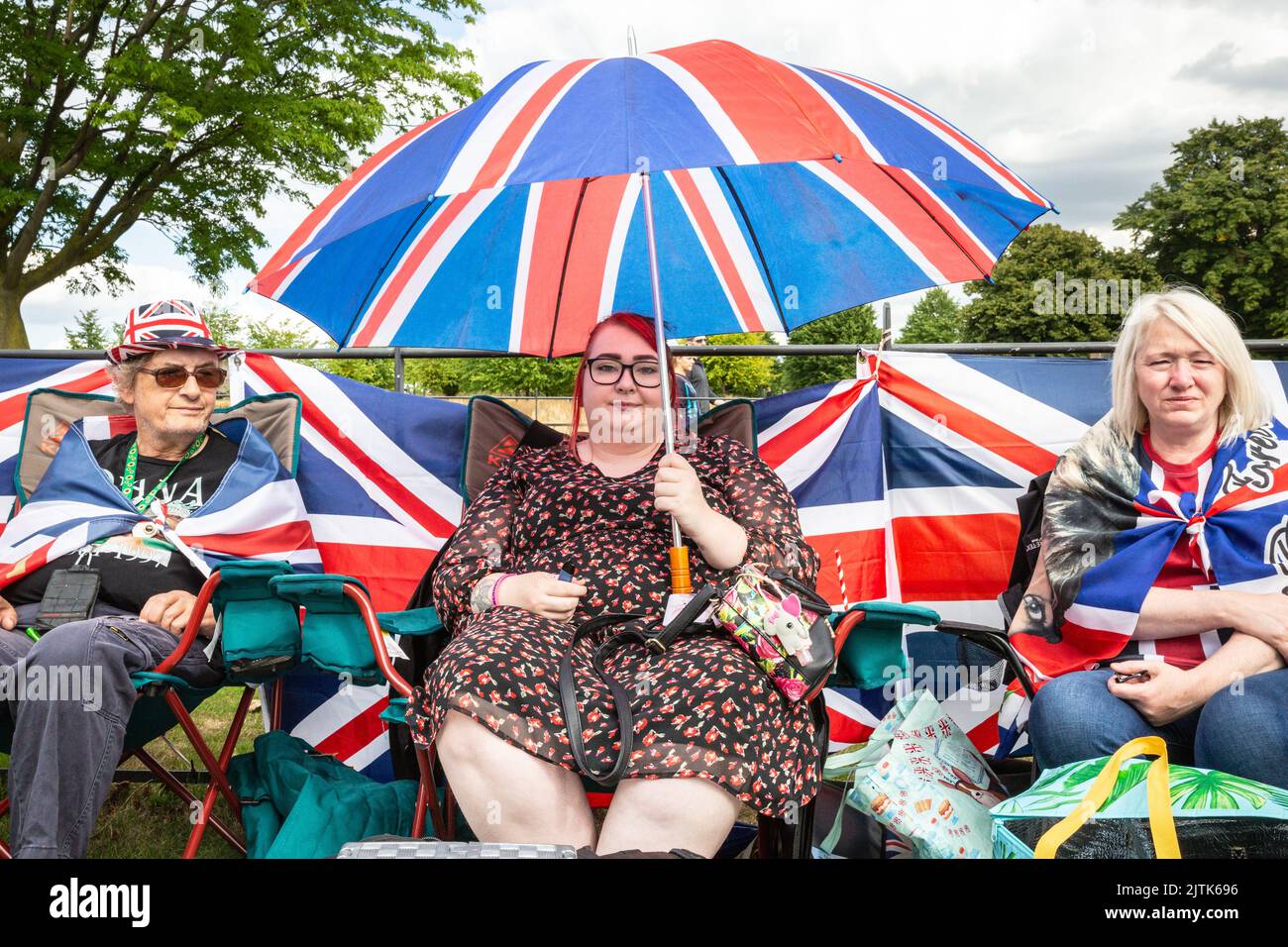 London, UK. 31st Aug, 2022. Three Royal Superfans at the gates. Royal fans and visitors gather at the gates to Kensington Palace to commemorate the 25th anniversary of th tragic death of Diana Princess of Wales. Credit: Imageplotter/Alamy Live News Stock Photo
