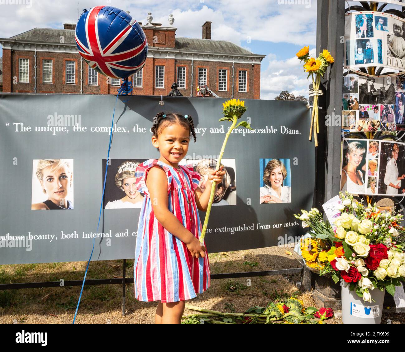 London, UK. 31st Aug, 2022. Amira, 3yrs old, is here with her family to remember Diana. Royal fans and visitors gather at the gates to Kensington Palace to commemorate the 25th anniversary of th tragic death of Diana Princess of Wales. Credit: Imageplotter/Alamy Live News Stock Photo