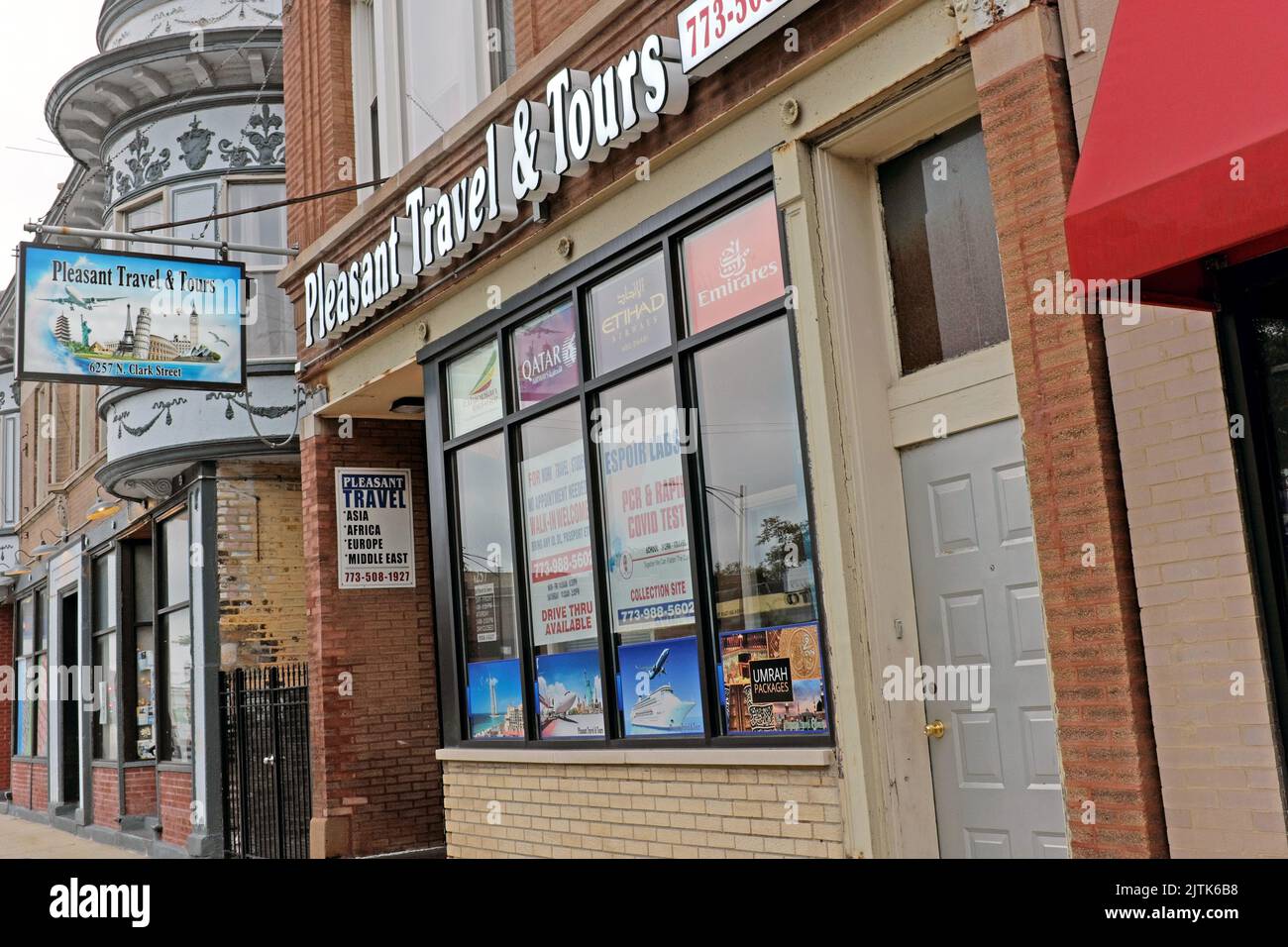 Storefront travel agency, Pleasant Travel & Tours, on Clark Street in Chicago, Illinois, USA. Stock Photo