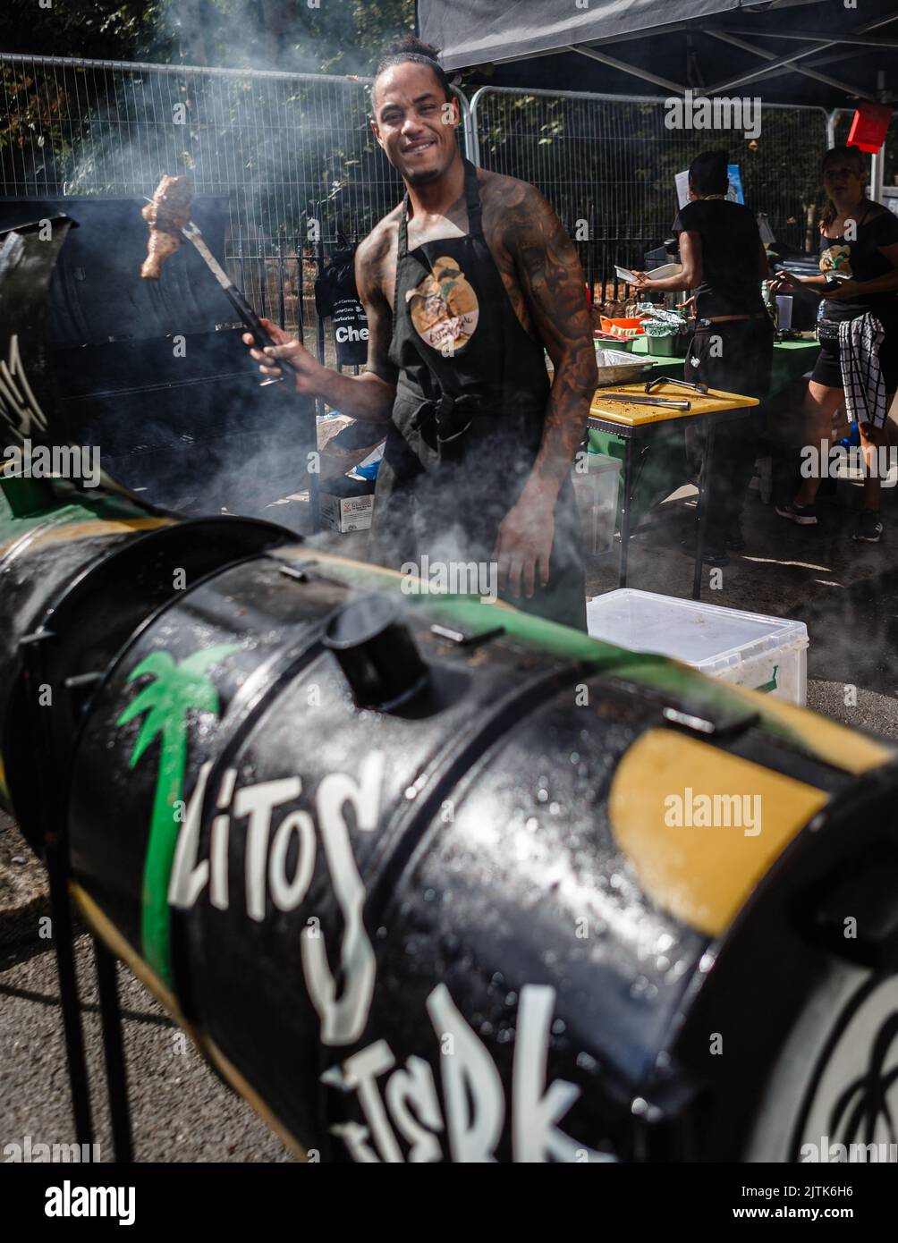 Steaming tasty grilled chicken at the Notting Hill Carnival. Stock Photo