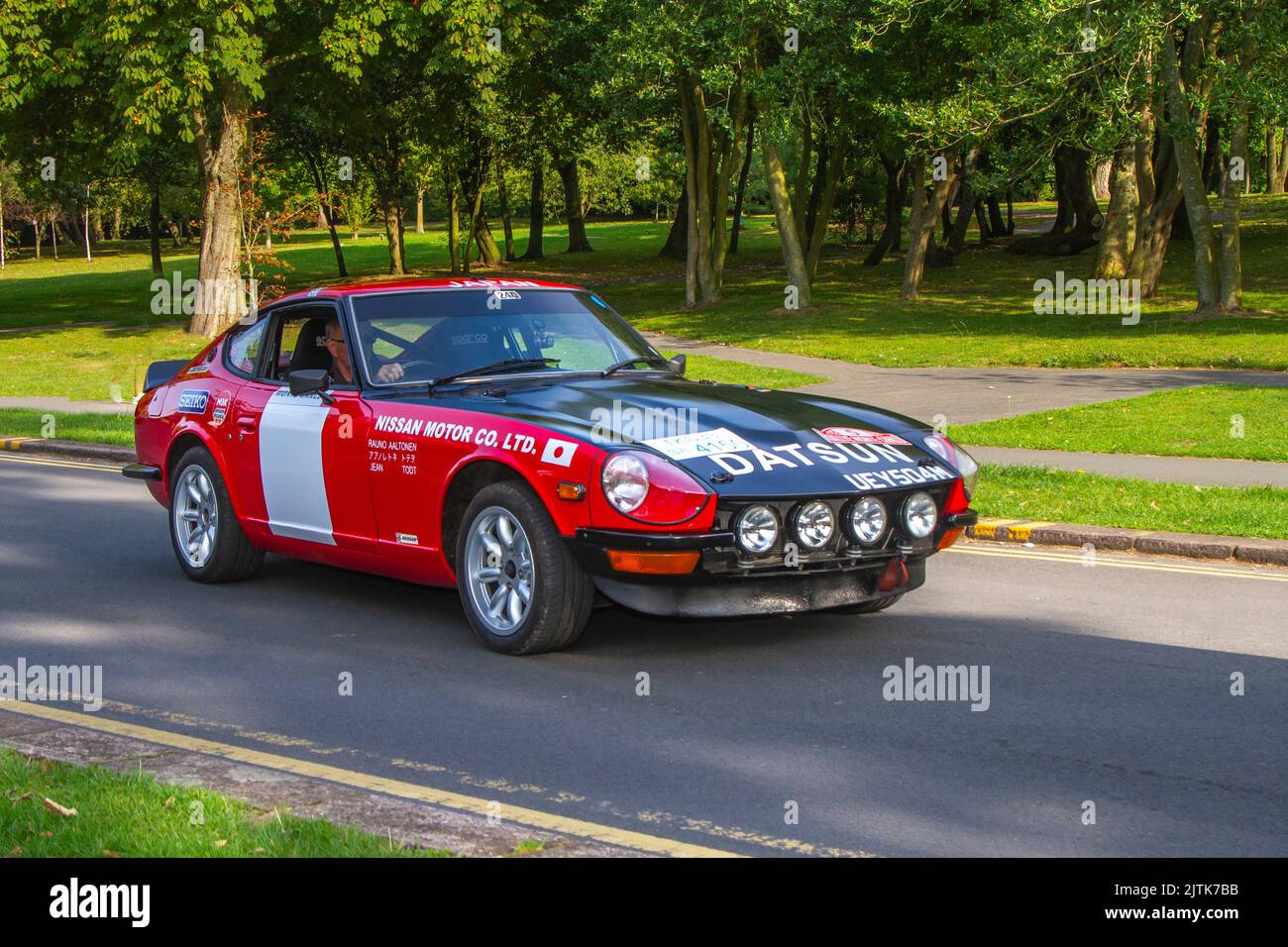 1972 70s, seventies DATSUN 240Z 2393cc sports rally car. Supercar arriving at the annual Stanley Park Classic Car Show. Stanley Park classics yesteryear Motor Show is hosted by Blackpool Vintage Vehicle Preservation Group, UK. Stock Photo