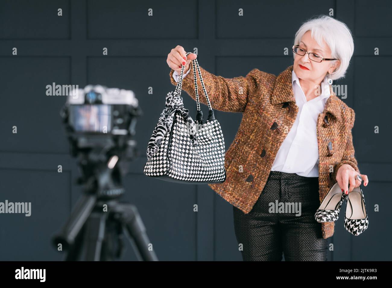 successful senior woman fashion lifestyle blogging Stock Photo