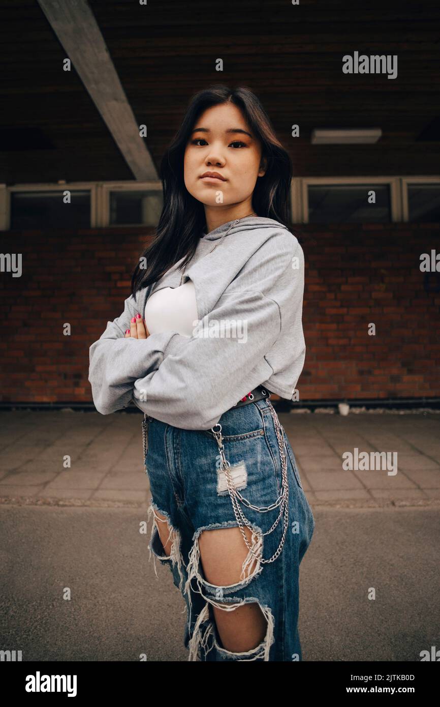 Woman wearing blue jeans arms hi-res stock photography and images - Alamy