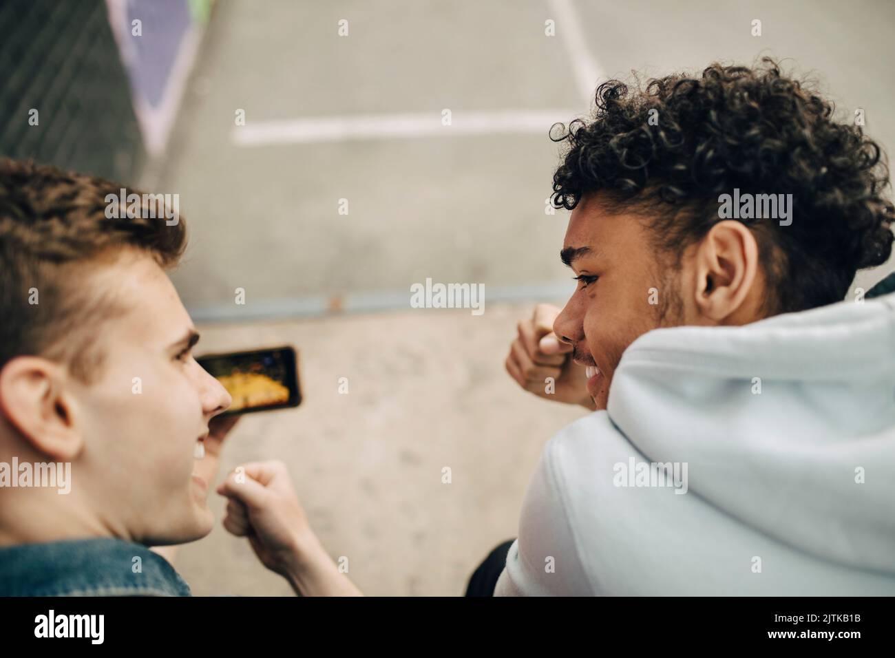 Group young gen friends sitting hi-res stock photography and images - Alamy