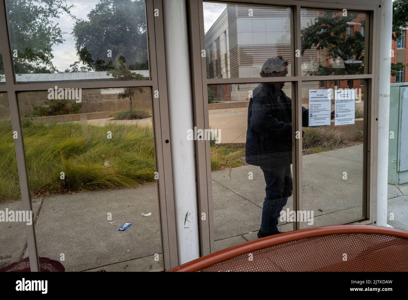 Vacaville, California, USA. 1st Aug, 2022. MARK RIPPEE goes behind a bus stop in Vacaville to urinate in a cup and complains there are no bathrooms. Rippee is blind, schizophrenic and homeless. (Credit Image: © Renee C. Byer/Sacramento Bee/ZUMA Press Wire) Stock Photo