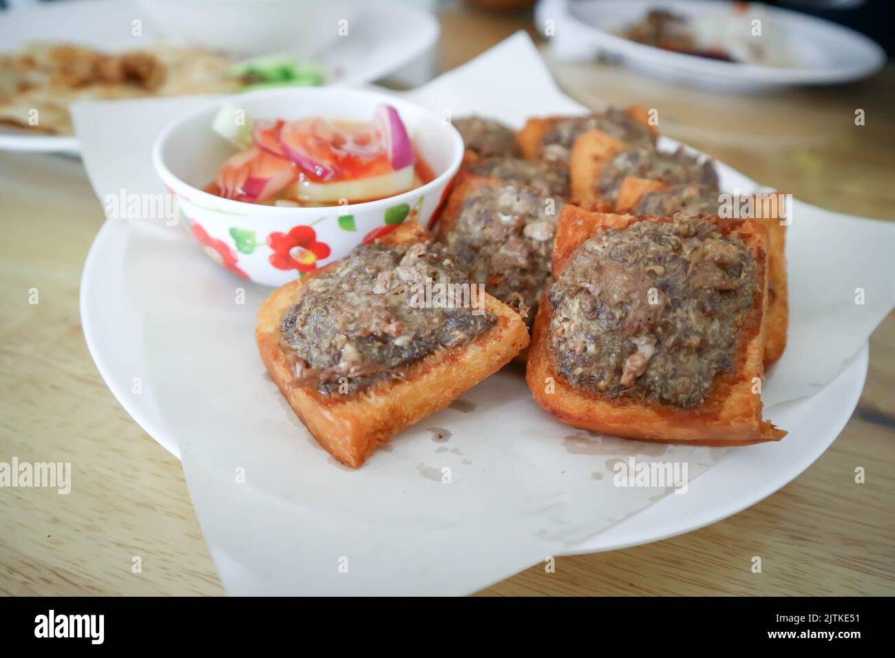 fried bread with minced pork spread or fried bread with minced beef