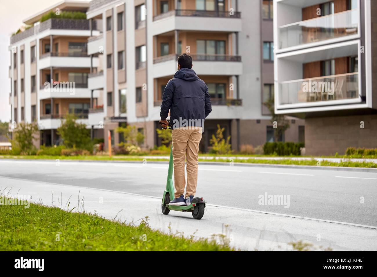 Indian man riding scooter hi-res stock photography and images - Alamy