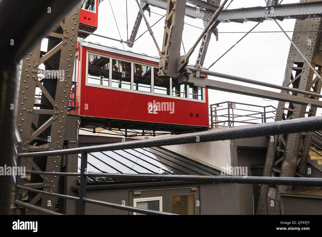 VIENNA, AUSTRIA - MAY 15, 2019: This is a traditional red wagon on an old ferris wheel in Prater Park. Stock Photo