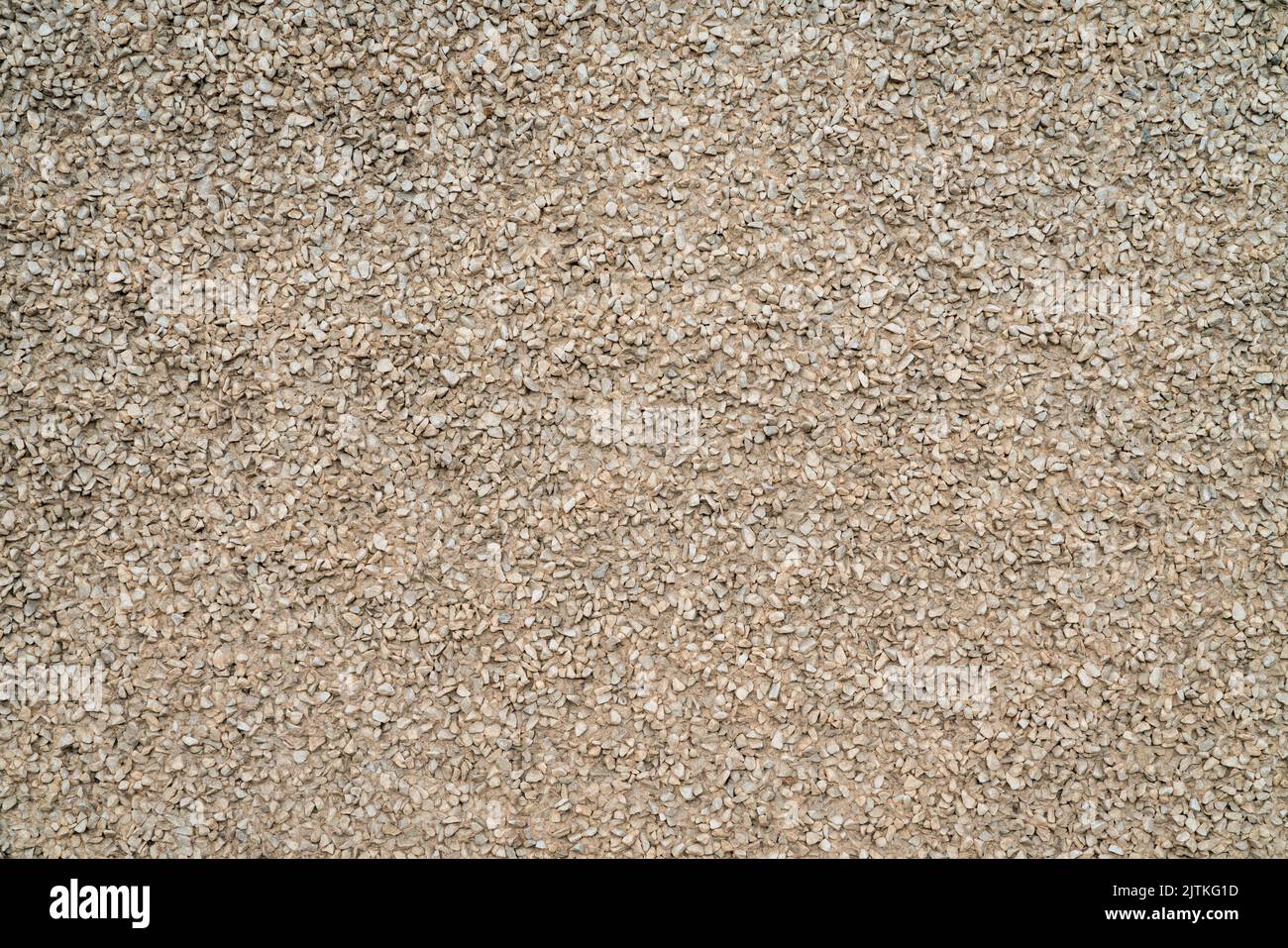 urban texture and background - building facade finished with fine gravel Stock Photo