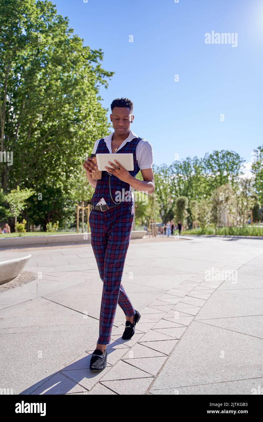 Elegant african man walking in hi-res stock photography and images - Alamy