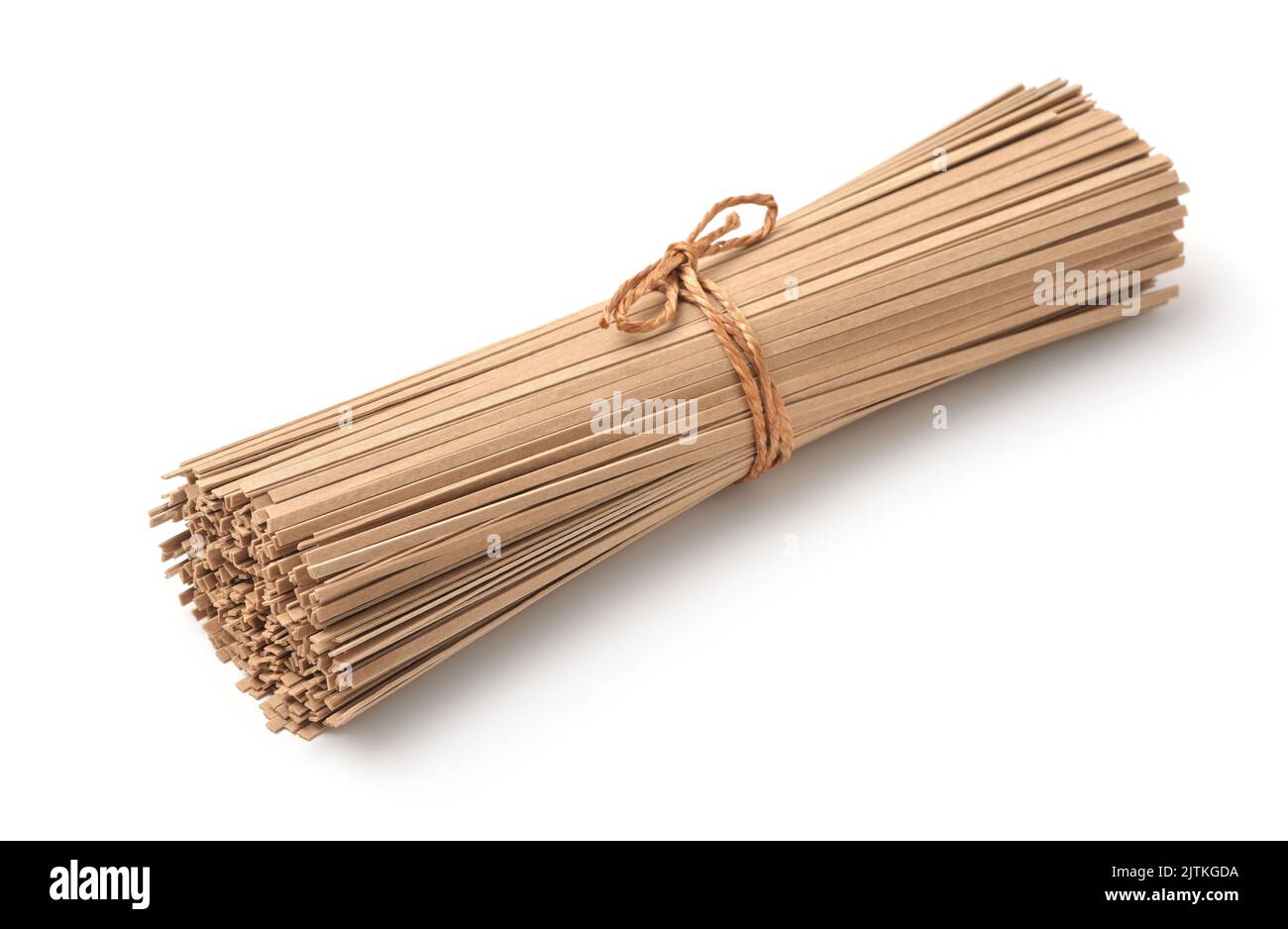 Bunch of uncooked buckwheat soba noodles isolated on white Stock Photo