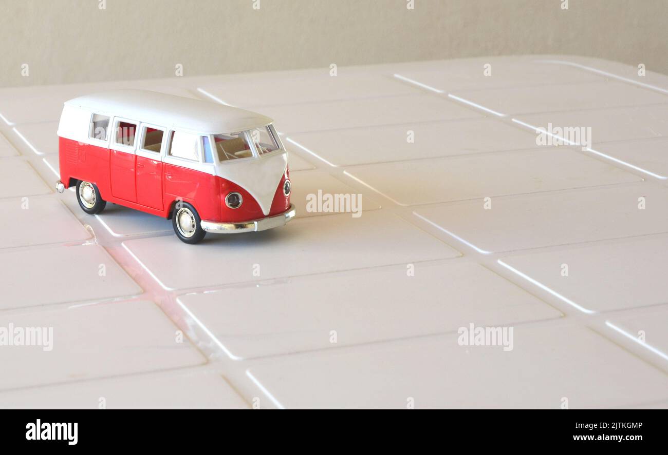 Diecast, Iron miniature, red color van, Brazil, South America, side view, selective focus, white background, copy space Stock Photo