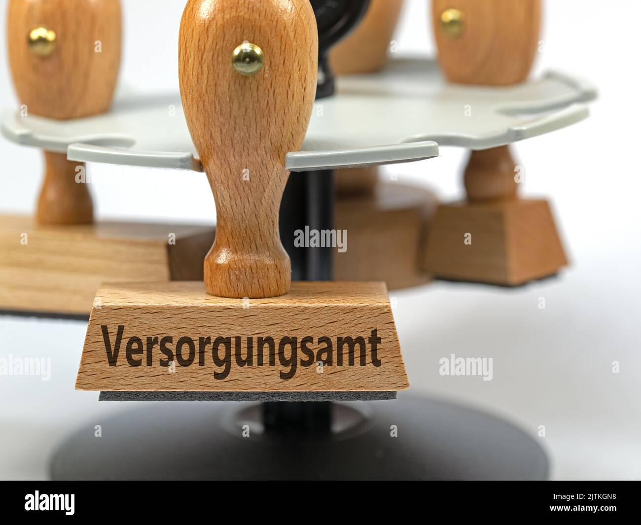 Wooden stamp with the imprint 'Versorgungsamt', translation 'Pension Office' Stock Photo