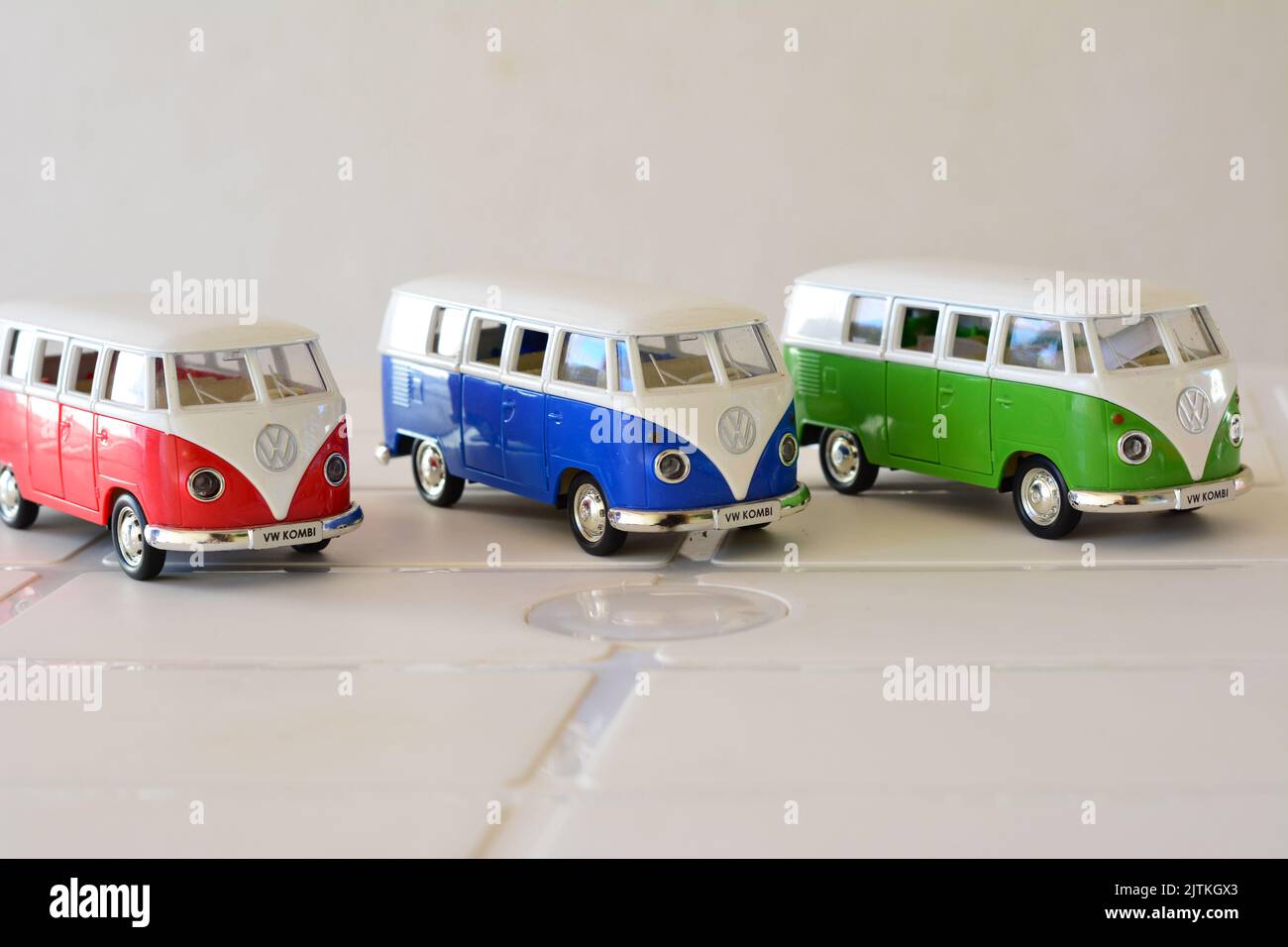 Diecast, Iron miniature, van in various colors, Brazil, South America, side view, selective focus, white background, with open doors, copy space Stock Photo