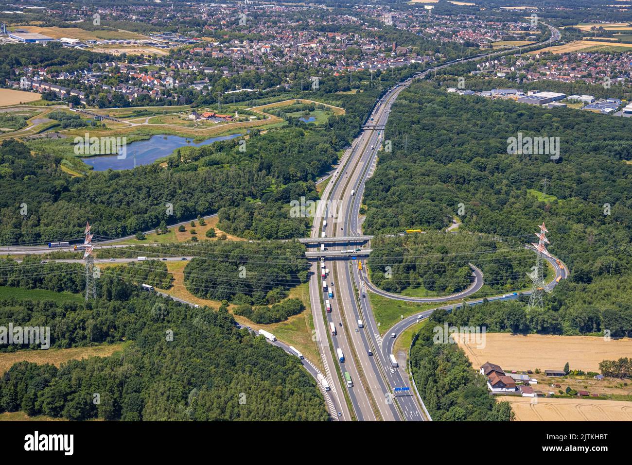 Aerial view, freeway junction Dortmund-Nordwest with A45 and A2, flood retention basin Mengede / Emscher-Auen, yard Emscher-Auen, Ickern, Castrop-Raux Stock Photo
