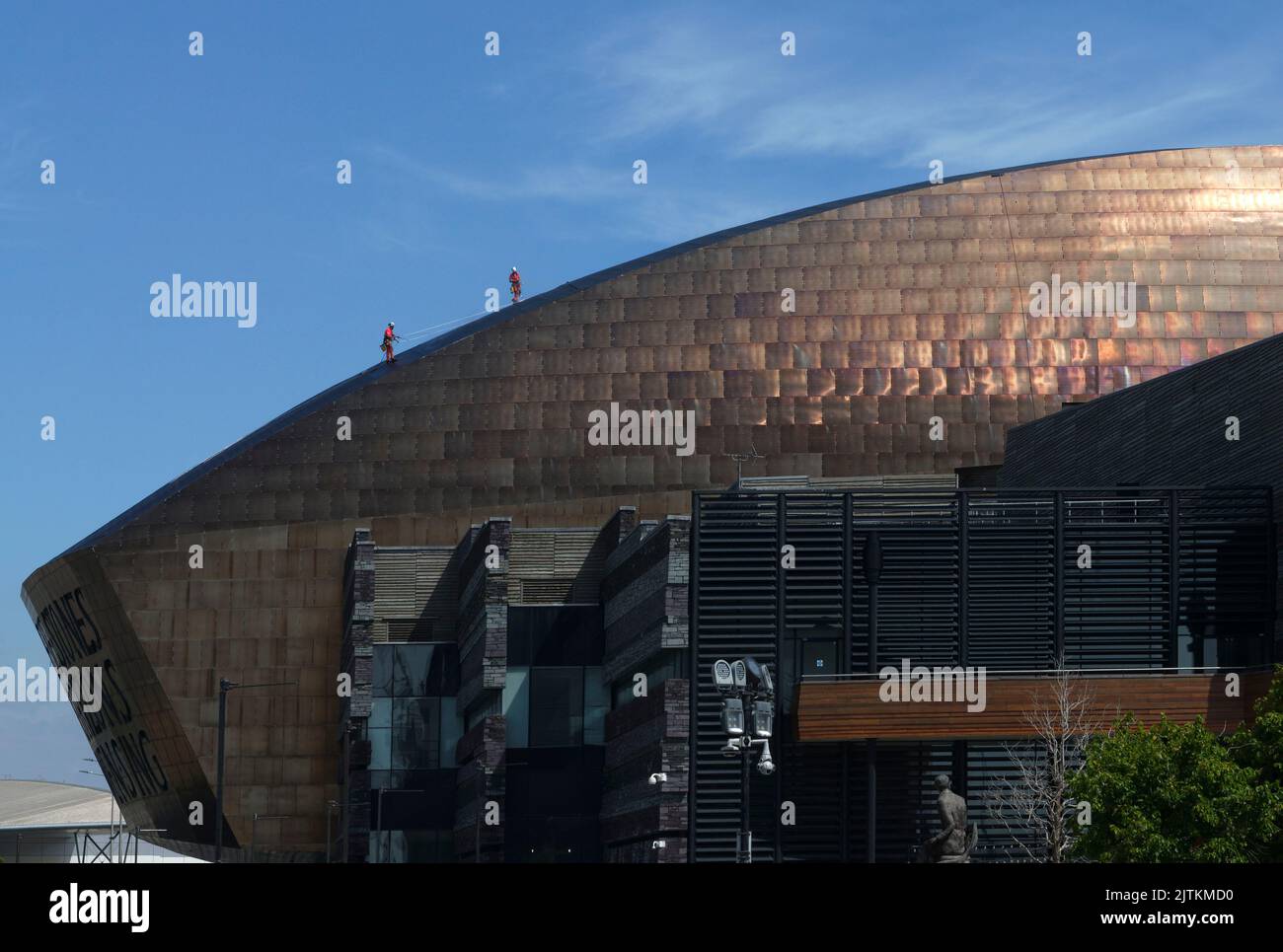 Cardiff Millennium Centre, Cardiff Bay, 2022. summer. Men with safety
