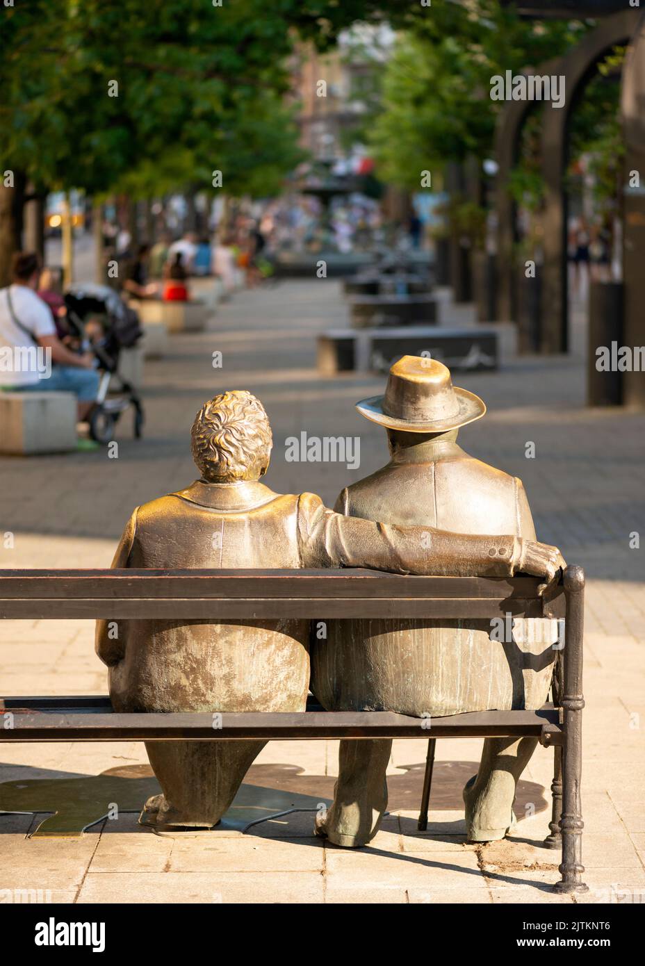 The popular bench Statue of Slaveikovs in Slaveikov Square downtown Sofia, Bulgaria, Eastern Europe, Balkans, EU Stock Photo